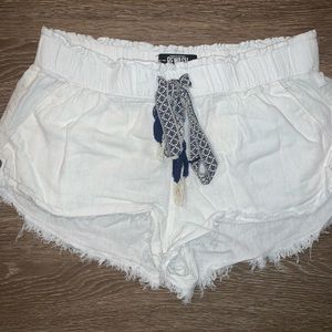 White shorts with blue waist tie. Size M.